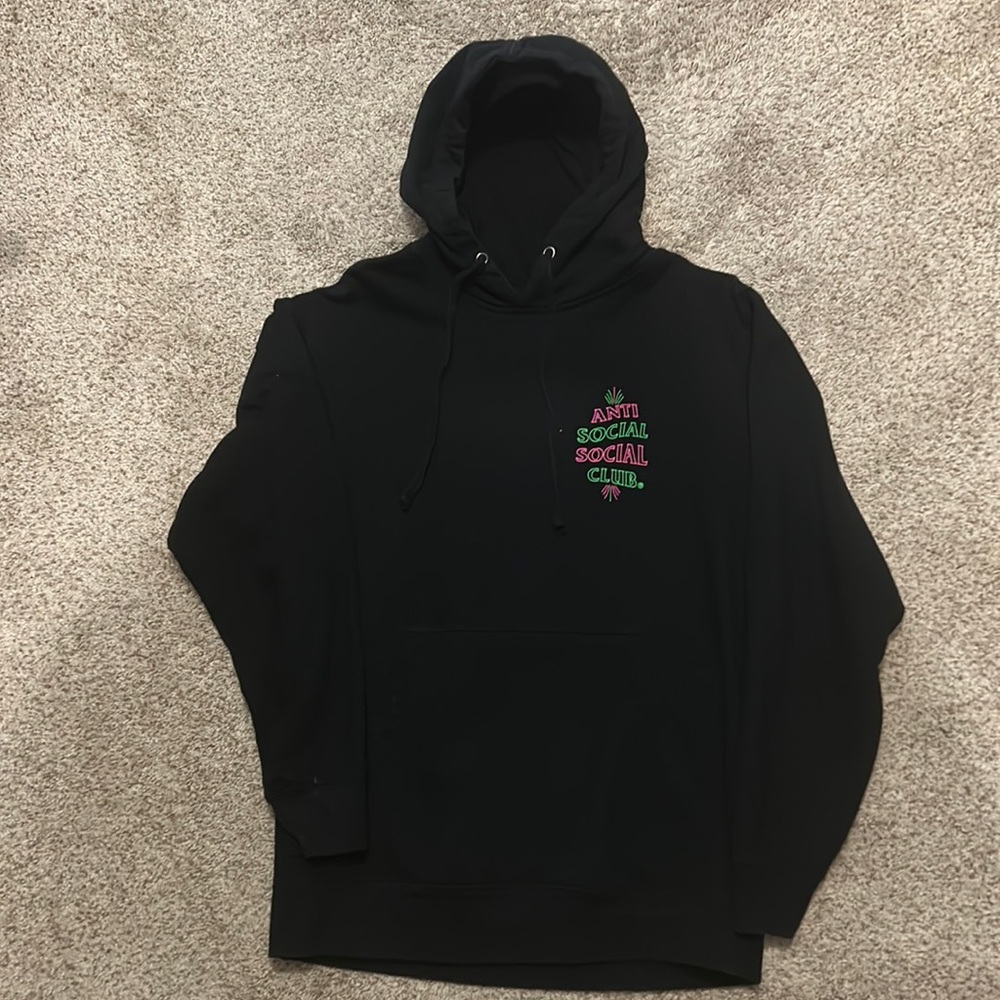 Anti Social Social Club hoodie with neon pink and green lettering.